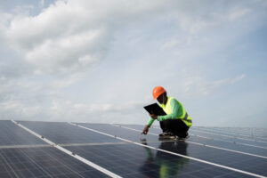 Technician Engineer Checks Maintenance Solar Cell Panels